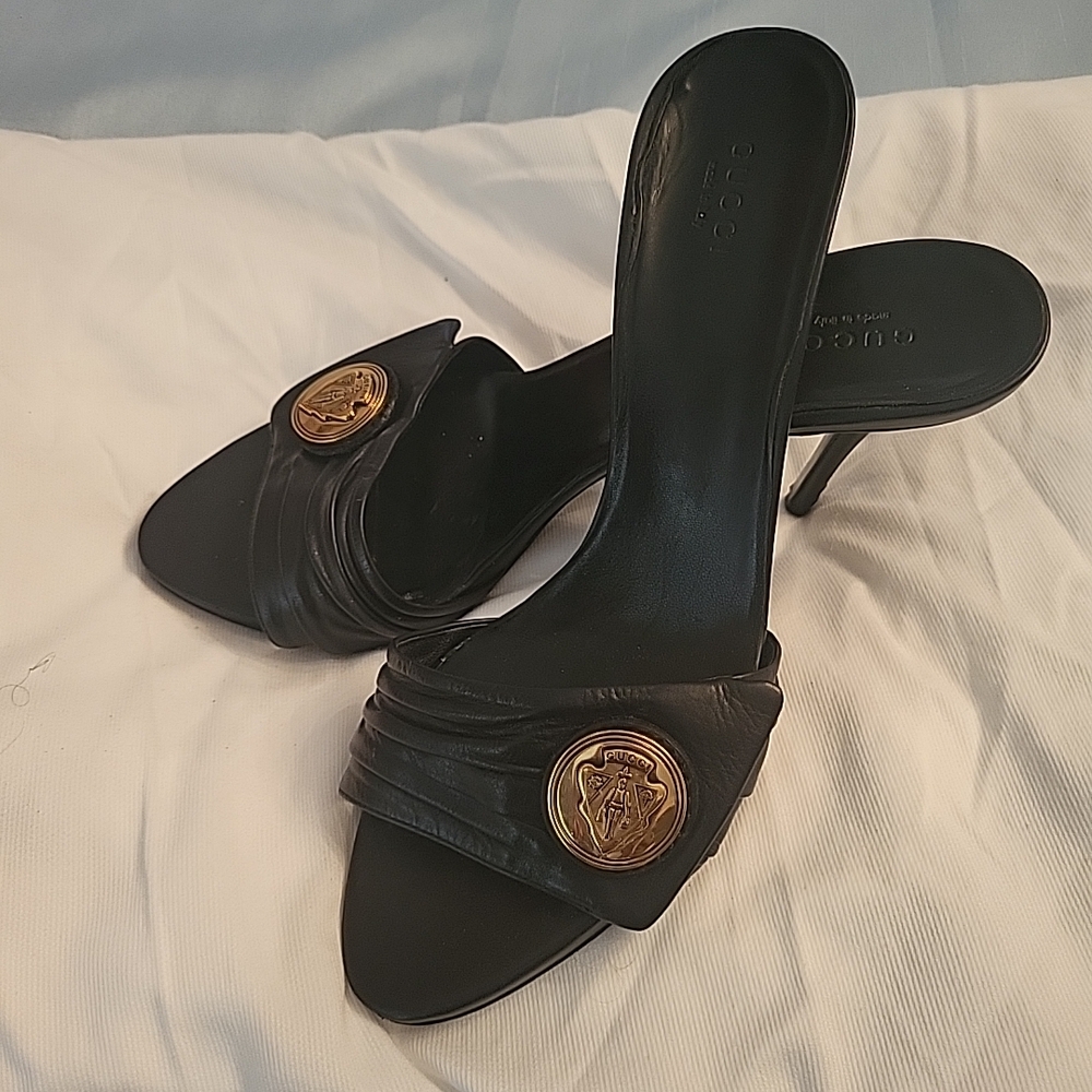 Gucci Black Leather Slide Sandals with Gold Medallion